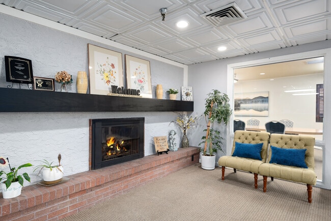 Entry Fireplace - Cove Point Retirement - Independent Living