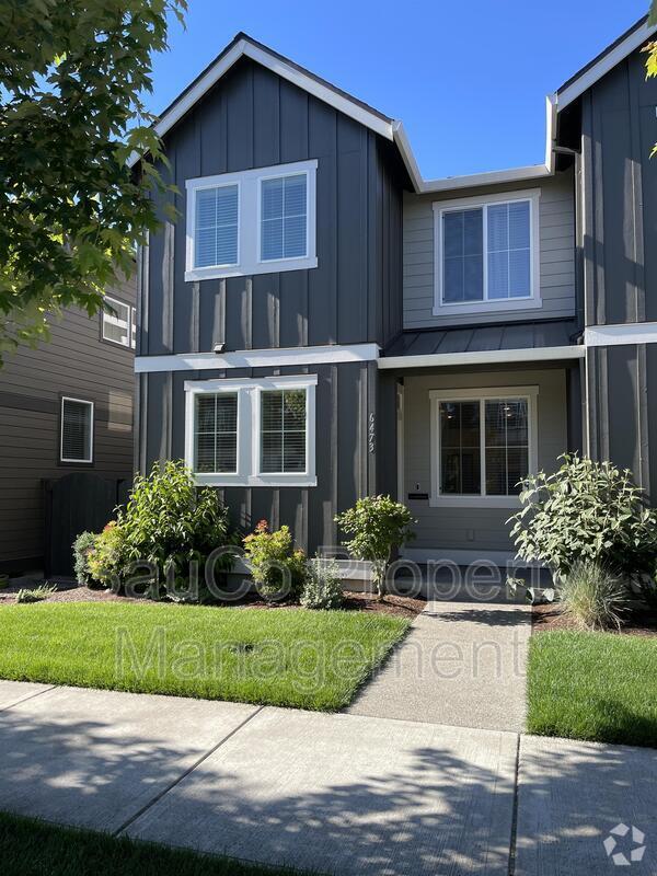 Building Photo - 6473 SE Genrosa St
