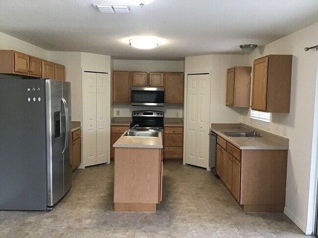 Foto del edificio - 5449 NW Wisk Fern Cir