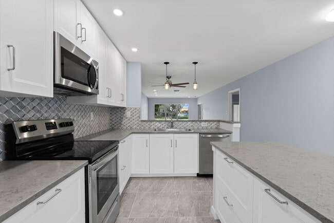 Building Photo - 5750 Princess Palm Ct