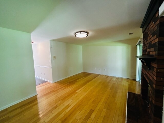 Entry level floor with fireplace. - 9622 Hadleigh Ct