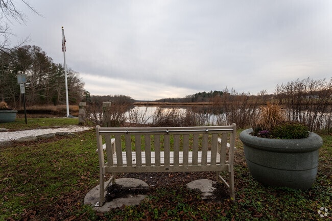 Nature's poetry unfolds at Berkley Park, where Dighton's lake view captivates the soul.