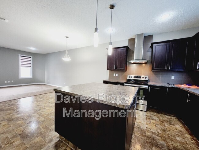 Building Photo - 1203 McConachie Blvd NW
