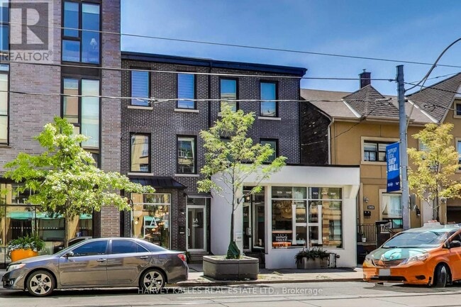 Building Photo - 1025 Queen St E
