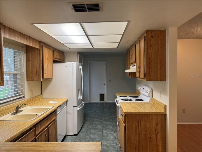 Foto del edificio - 4010 Woodsong Dr