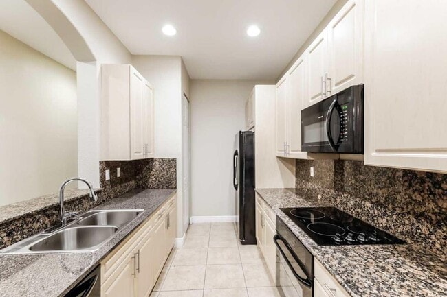 Building Photo - 6990 Julia Gardens Dr