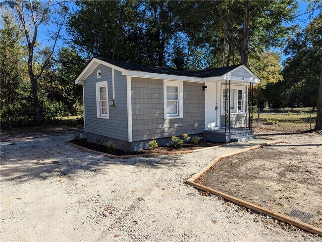 Building Photo - 318 Cude St