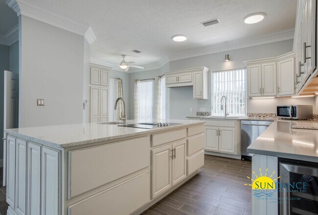 Building Photo - Updated Waterfront Townhome with Incredible Features and Boat & Jet Ski Lifts!