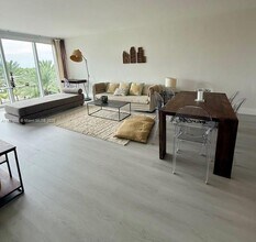 Building Photo - 10275 Collins Ave