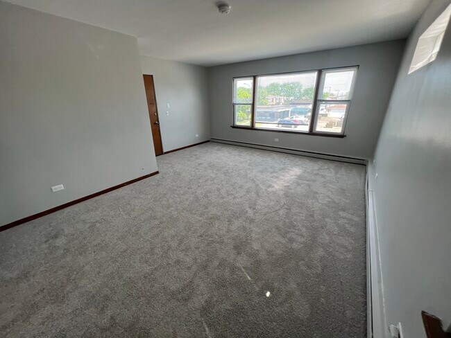 Building Photo - 7935 W Belmont Ave