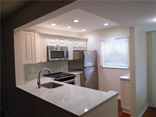 Building Photo - 608 SW Natura Blvd