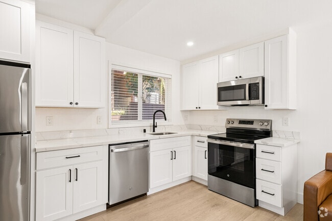 3BR, 1BA - 692SF - Kitchen - 12 Panoramic Apartments