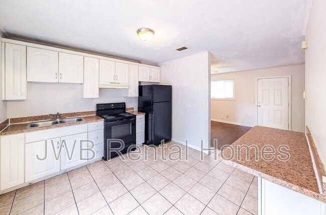 Foto del edificio - 4503 Melvin Cir W