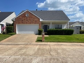 Building Photo - 409 Teak Dr