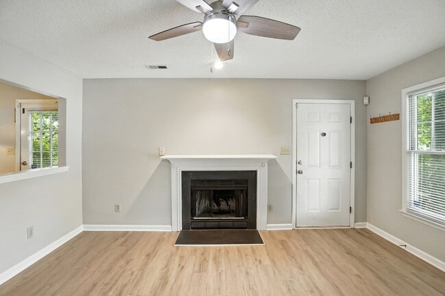 Building Photo - Spacious 2-Bedroom, 2.5-Bath End-Unit Town...
