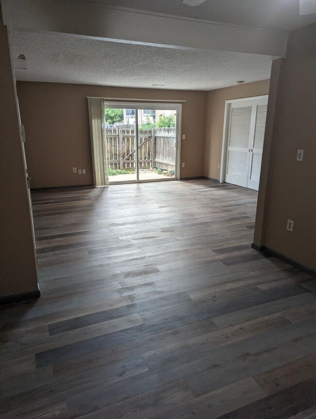 Dining room to family room to walk out fenced patio - 12162 Huron St