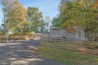 Building Photo - 8115 King Arthurs Ct