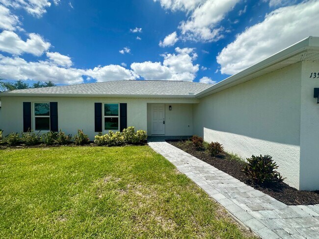 Building Photo - Available Now!! NW CAPE CORAL - 4 Bedrooms - 3 Bathrooms - 2 Car Garage