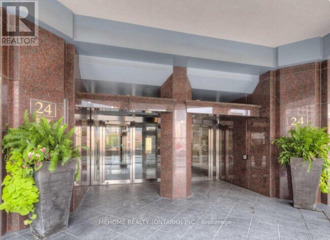 Photo du bâtiment - 24 Wellesley St W