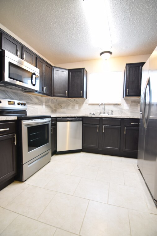 Foto del edificio - 2111 Coach Dr