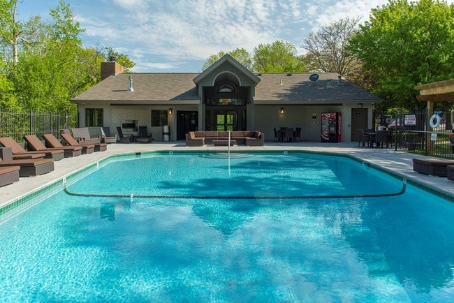 Heated outdoor pool and clubhouse - The Woodlands of Minnetonka Apartments