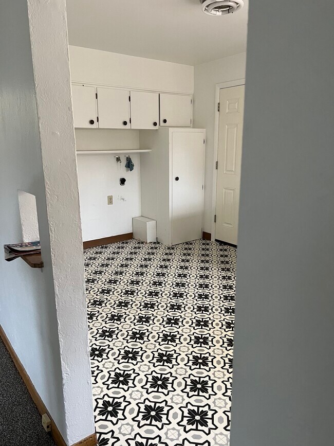 New flooring - 4601 Otis St