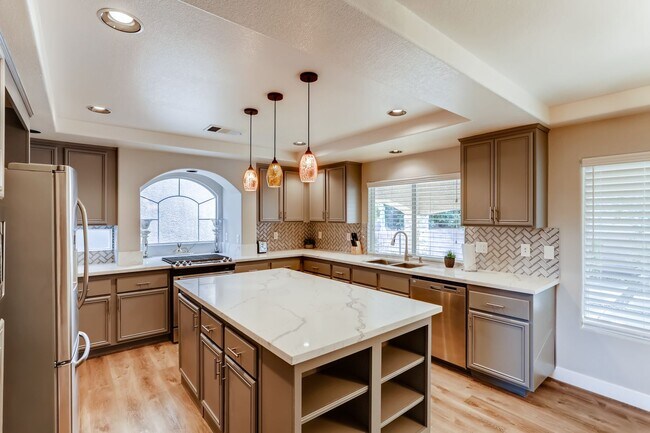 Building Photo - Modern 5-Bedroom, 3-Bathroom Oasis with a 3-Car Garage in the Heart of Las Vegas