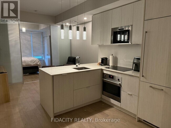 Photo du bâtiment - 101 Queen St