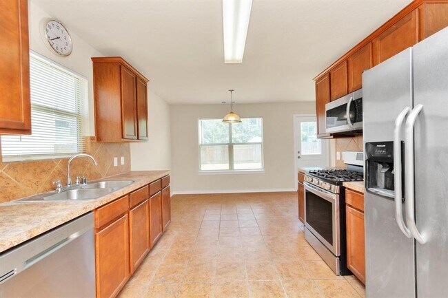Building Photo - 8906 Wildbird Ln