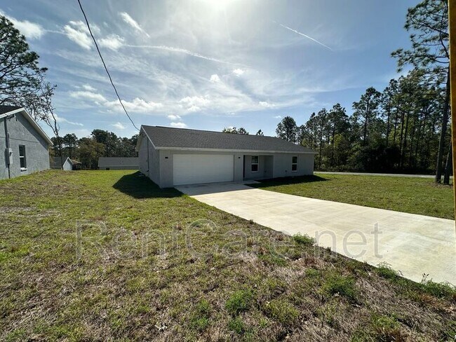 Building Photo - 7043 N Outrigger Terrace