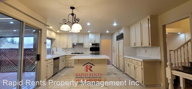 Building Photo - 4 br, 3 bath House - 9033 North Camden Drive