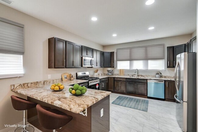 Foto del edificio - Brand-New 3-Bed, 2.5-Bath Condo: Modern Co...