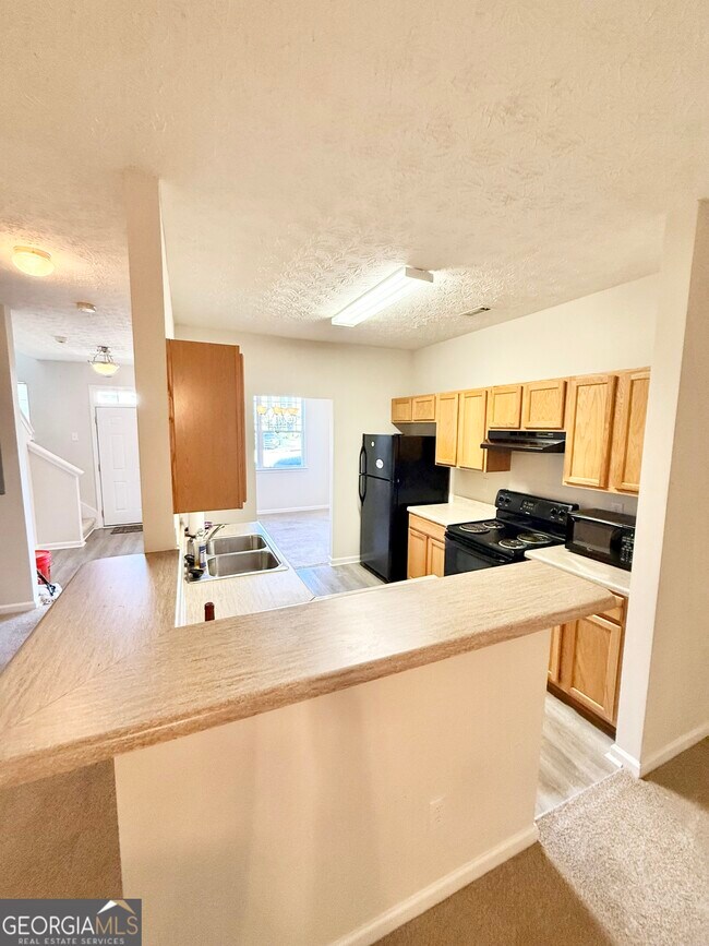 Foto del edificio - 6327 Ellenwood Dr