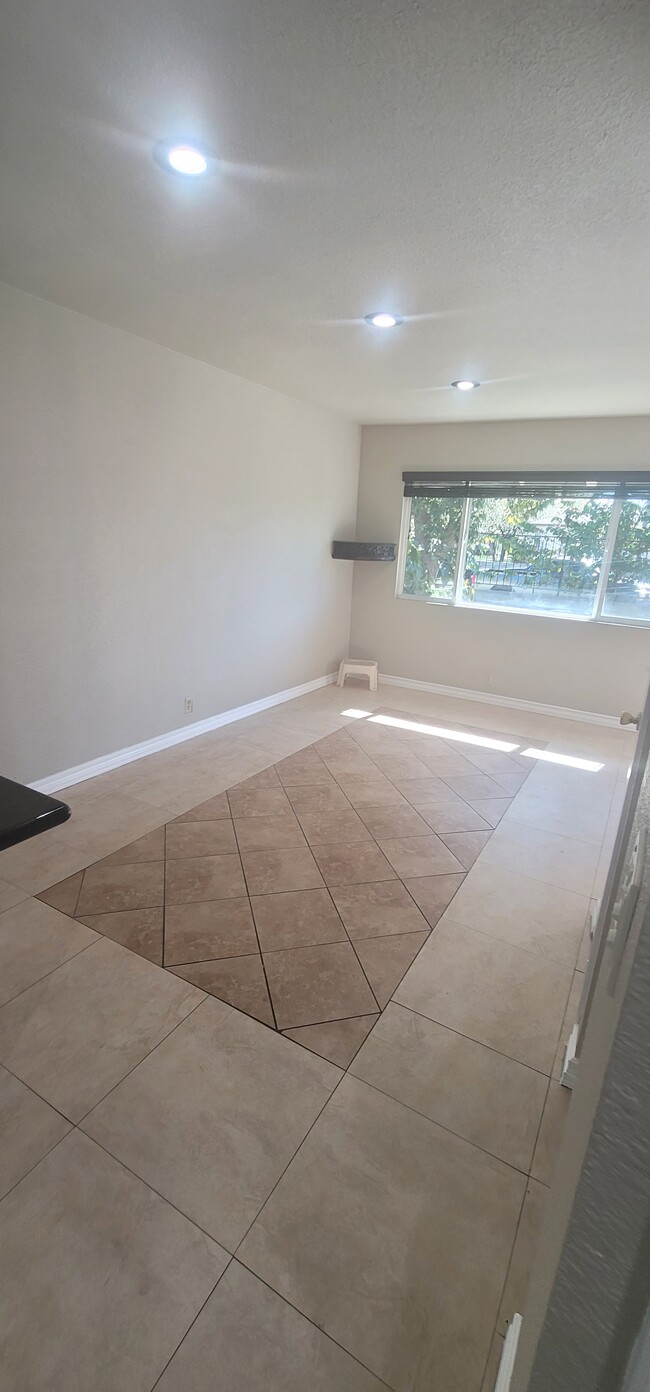 Nicely updated flooring in living room - 23521 Anchor Ave