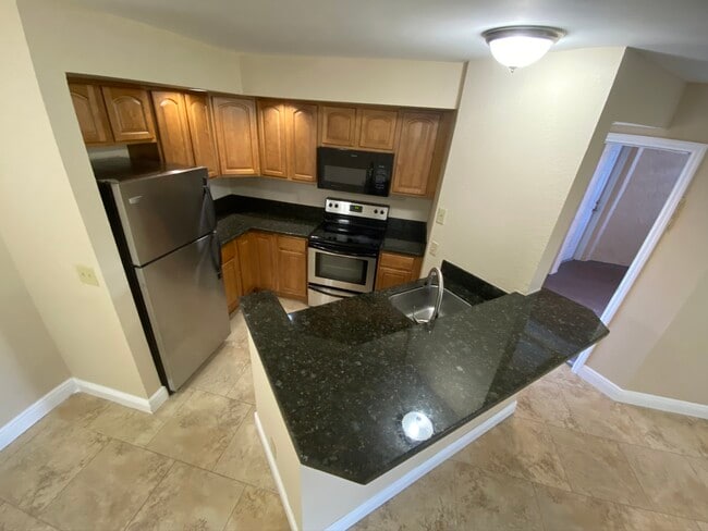 Building Photo - 3450 Pinewalk Dr N