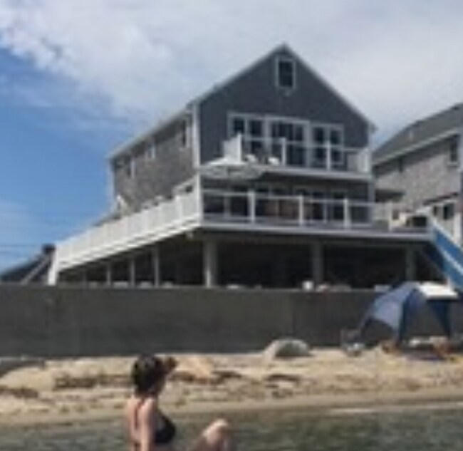 Back of house is oceanfront with protective seawall - 167 Turner Rd