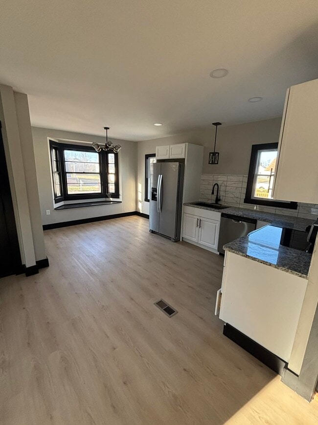 kitchen and dining - 166 E Bell St