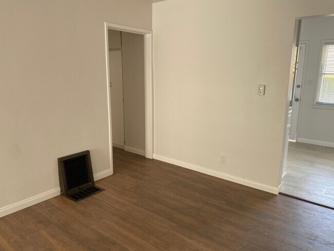LIVING ROOM: Floor Heater, with new Digital Thermostat - 507 E Harvard Rd