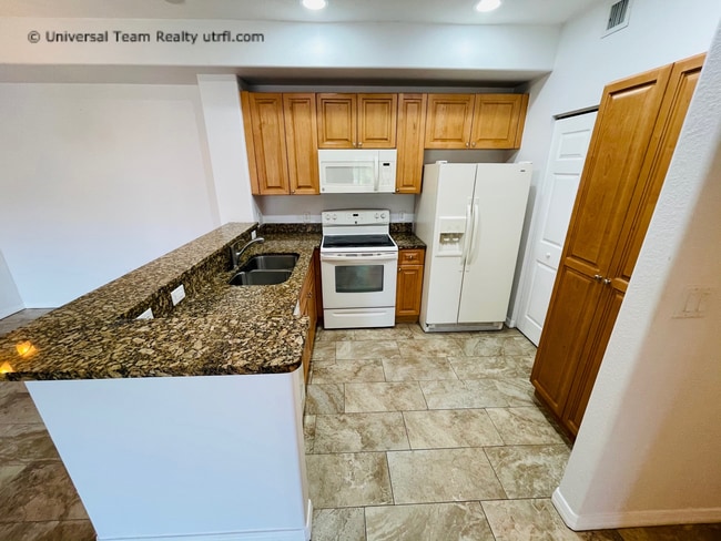 Photo - 13190 Bella Casa Cir Townhome