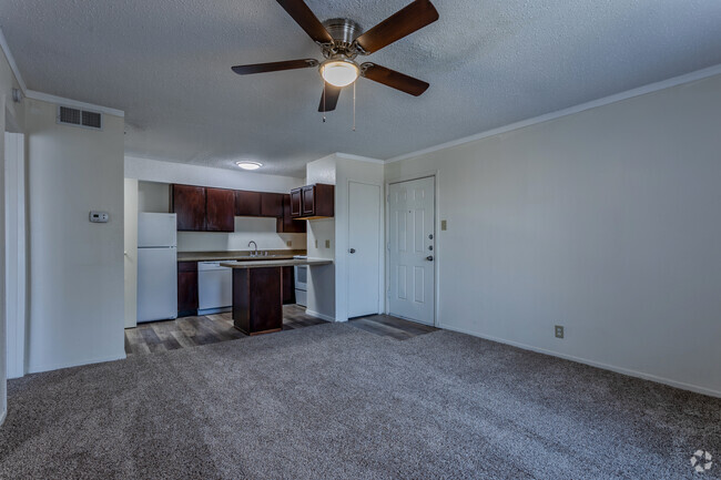 1BR,1BA - 700 SF - Living Room with Carpet - Silver Creek Apartments