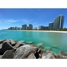 Building Photo - 10275 Collins Ave