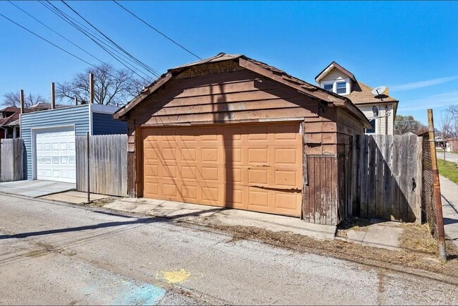 Building Photo - 1301 W 71st Pl