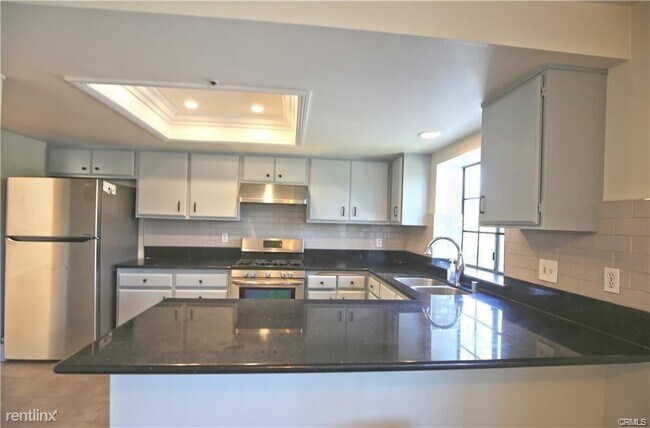 Building Photo - 3 br, 3 bath Condo - 105 E Beacon St Apt A