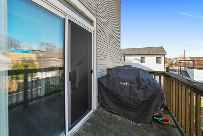 Deck off of the kitchen. - 1910 W School St