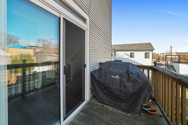 Deck off of the kitchen. - 1910 W School St