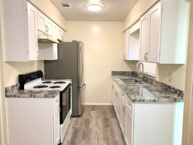 Building Photo - Beautiful 3/1.5 Home with Updated Kitchen,...