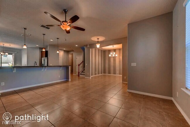 Building Photo - 4 br, 2.5 bath House - 5100 Millennia Gree...