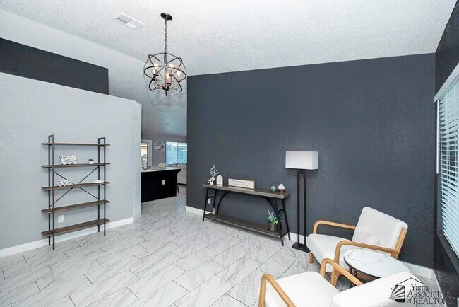 Foto del edificio - 7928-7942 E 42nd Ln