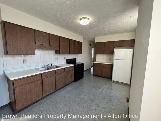 Foto del edificio - 2 br, 1 bath House - 900 e 7th st.