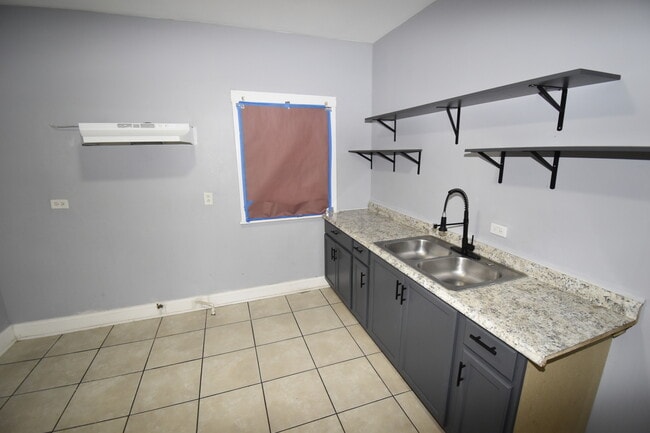 Foto del edificio - 5742 S Artesian Ave